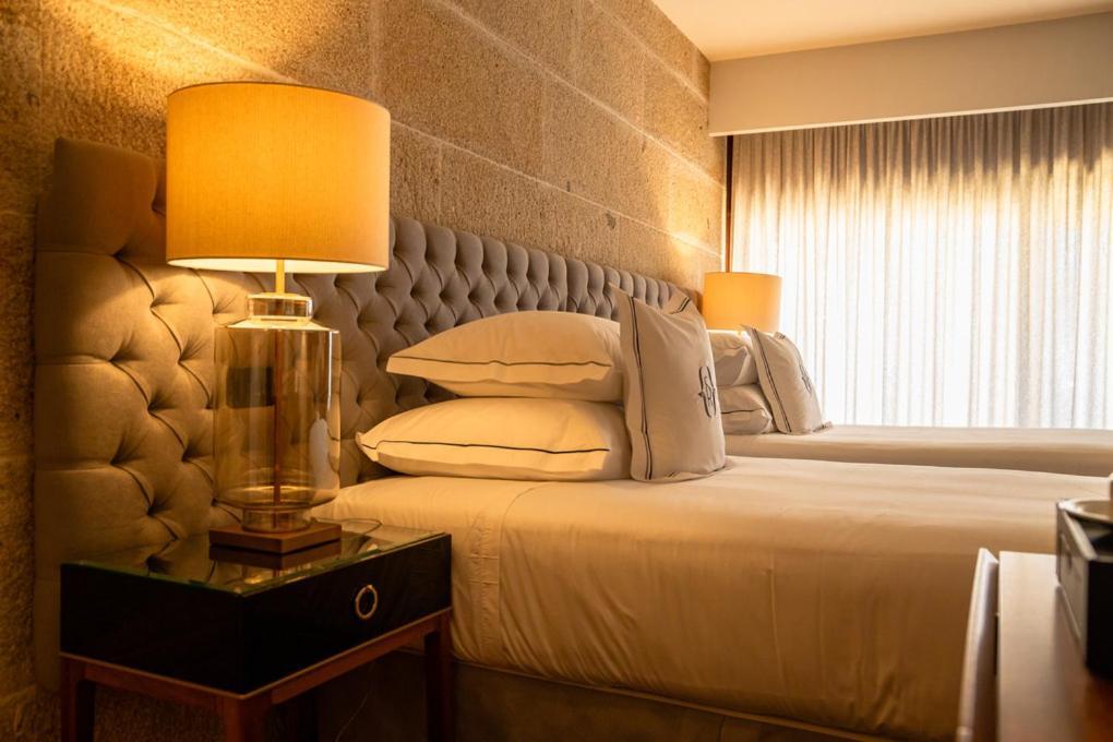 Solar Do Requeijo By Luna Hotels & Resorts 아르코스 데 발데베즈 외부 사진 A bedroom at the hotel